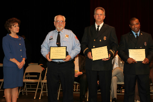 Lifesaving Award to Paramedic Crew Chief Jonathan Fueglein and Firefighter/EMT Jessica Jackson and members of E29C
