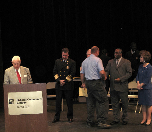 Charles Bryson congratulates Capt Jim Dietrich
