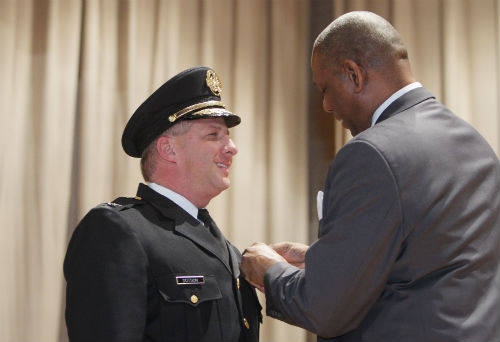Police Chief Sam Dotson receives his badge at a ceremony on Jan. 31, 2013.