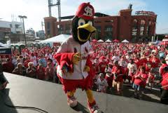 Fredbird leads St. Louis Cardinals fans during a pep rally in 2014.