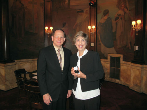 Donna Hlavaty receives her 40-year service pin from Mayor Francis G. Slay on April 19, 2013.