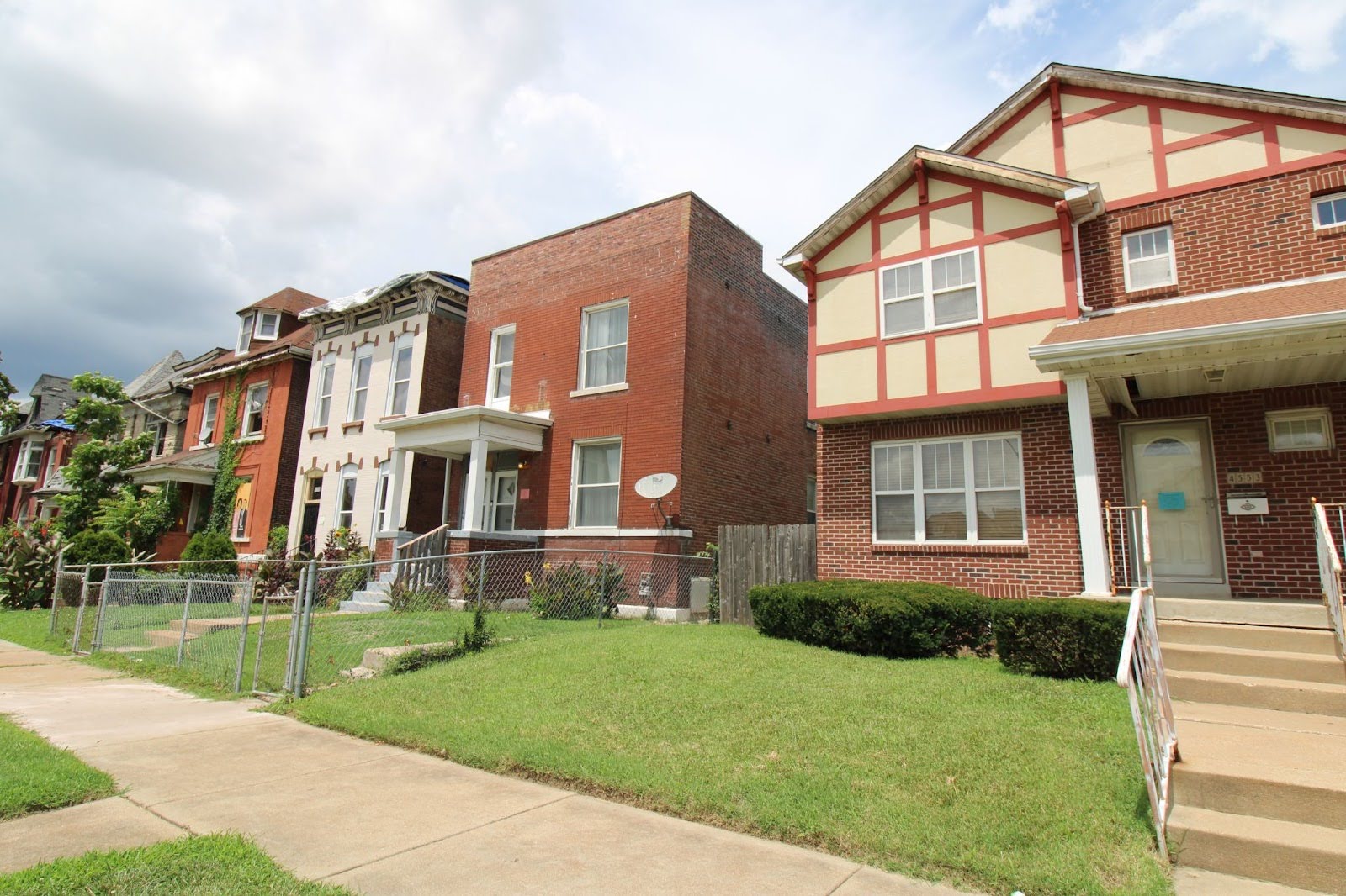 HHRP 2 Front street view of Ms. Holmes’ home, which was substantially damaged by the May 16th tornado.