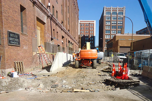 Road construction taking place in an alley