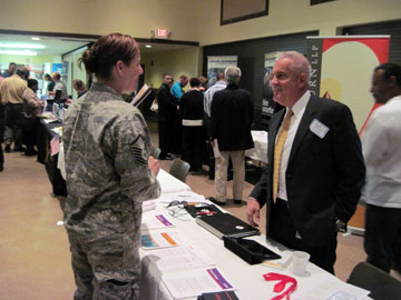 Unisys representative discusses employment opportunities with a veteran