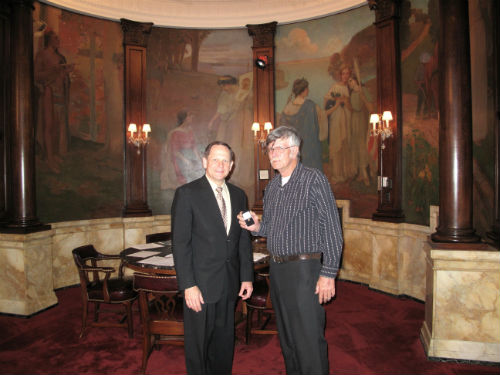 Donald Stevens receives his 40-year Service Pin from Mayor Francis G. Slay on April 19, 2013.