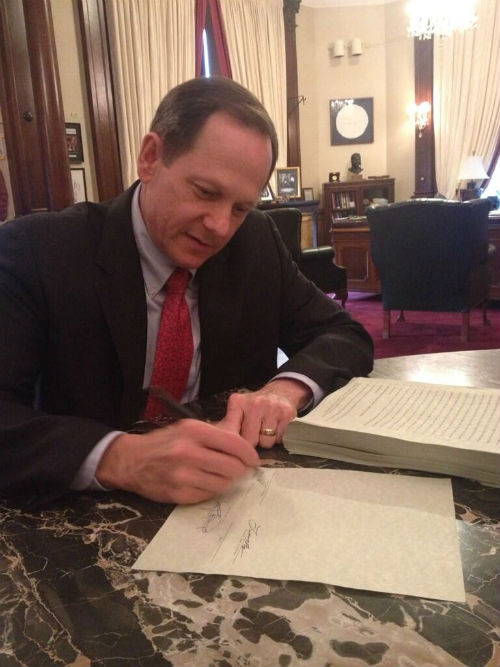 Mayor signs FY2015 budget June 27, 2014.