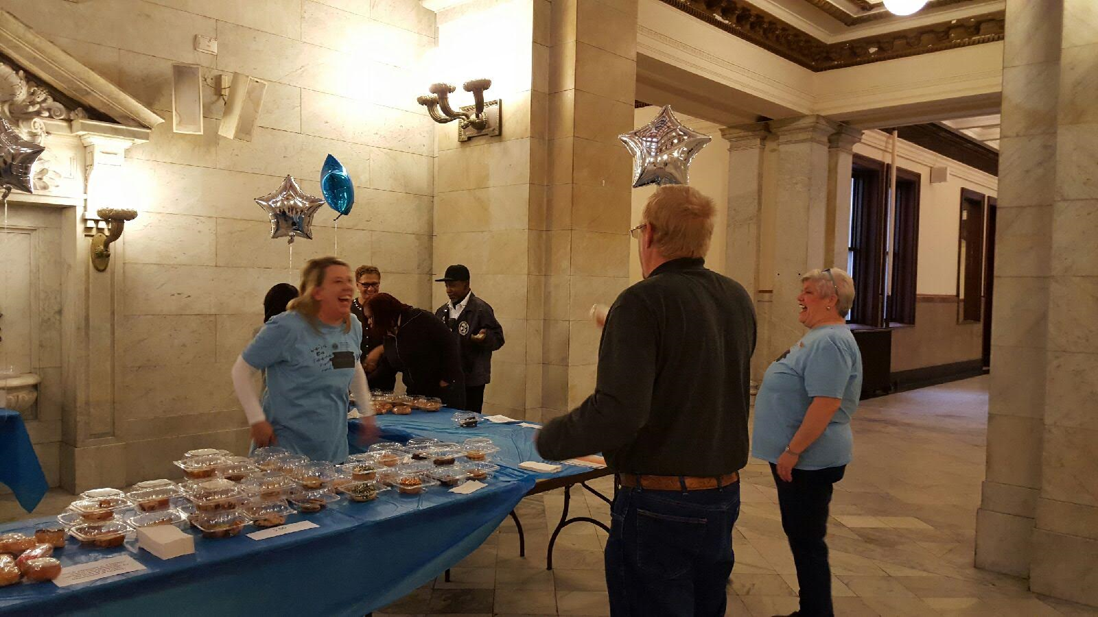 City employees look over the sweet treats at the Charity Bake Sale on Jan. 22, 2016.